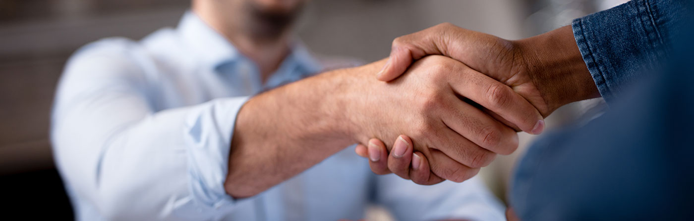 two people shaking hands